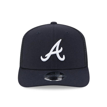Atlanta Braves MLB Evergreen Navy New Era 9SEVENTY Stretch Snap Adjustable Cap, front view with a raised white A logo on the front panel, featuring a curved visor and a 9SEVENTY size sticker on top of the visor.