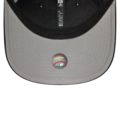 New York Yankees MLB Official Team Colour Navy New Era 9SEVENTY Stretch Snap Adjustable Cap, inside view showing the grey undervisor with a baseball-themed holographic sticker and the black sweatband featuring 9SEVENTY taping.