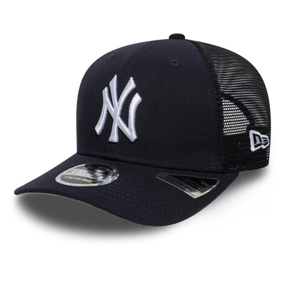 New York Yankees MLB Official Team Colour Navy New Era 9SEVENTY Stretch Snap Adjustable Cap, front view showing the raised white NY logo on the front panel, black mesh back, grey undervisor, and 9SEVENTY size sticker on the curved visor.