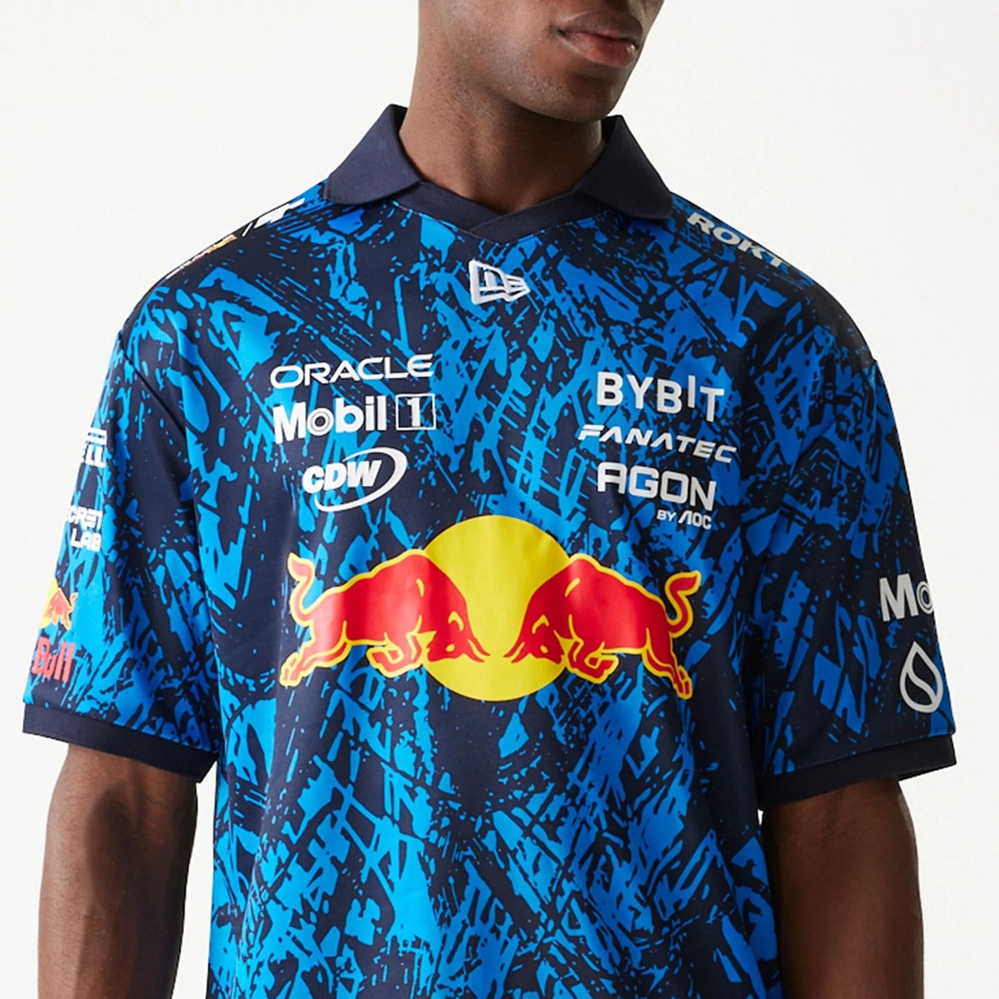 The Male model is wearing Red Bull Sim Racing Dark Blue V-Neck T-Shirt  3