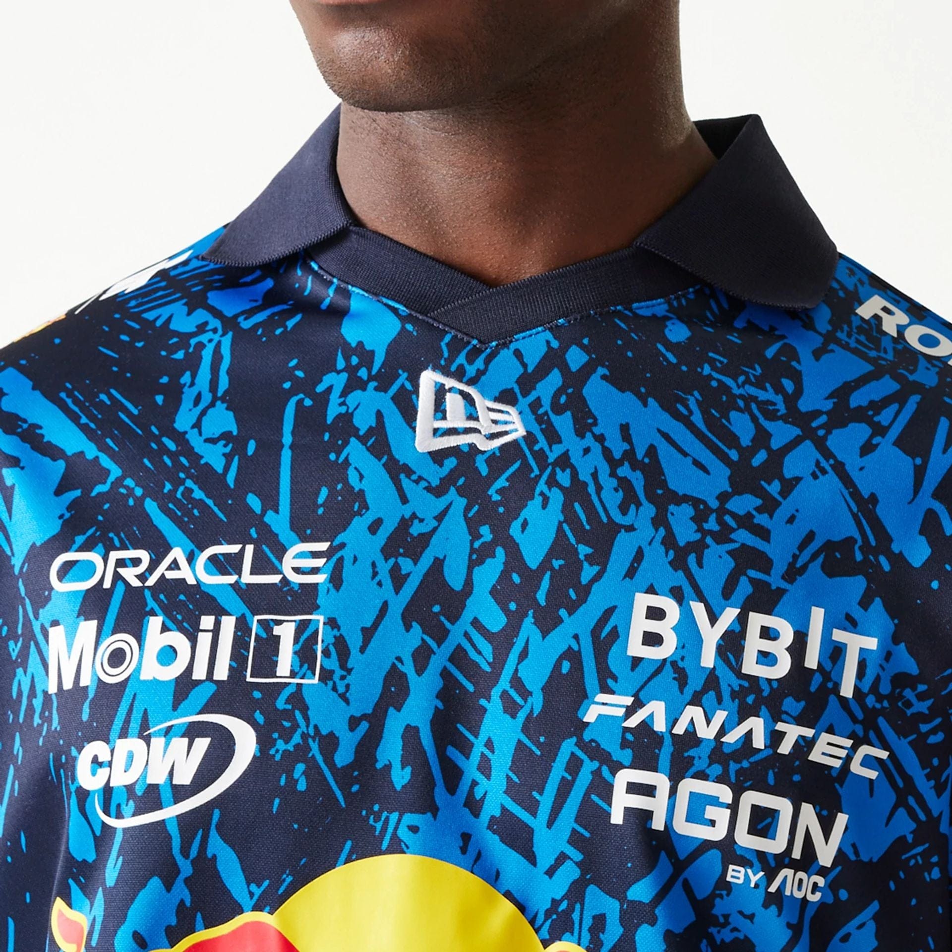 The Male model is wearing Red Bull Sim Racing Dark Blue V-Neck T-Shirt  5