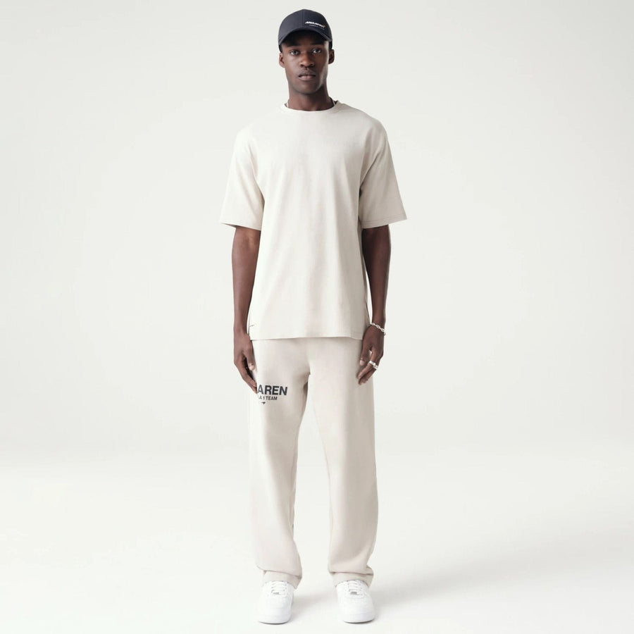 The Male model is wearing McLaren Racing Washed Pack Stone Oversized T-Shirt 8