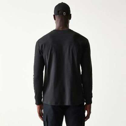 The Male model is wearing New York Yankees MLB Character Black Long Sleeve T-Shirt 2