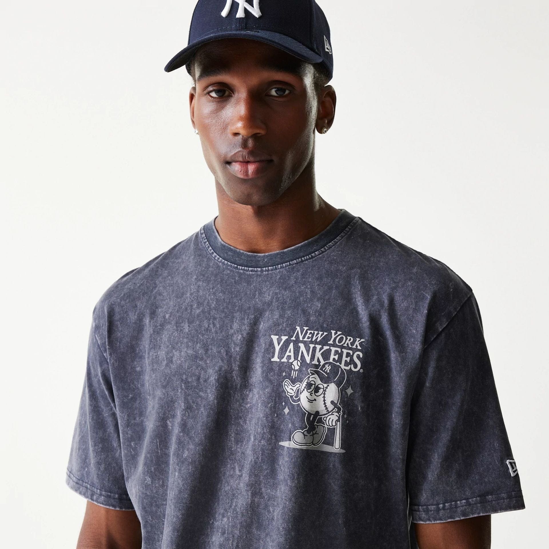 The Male model is wearing New York Yankees MLB Character Navy T-Shirt 4