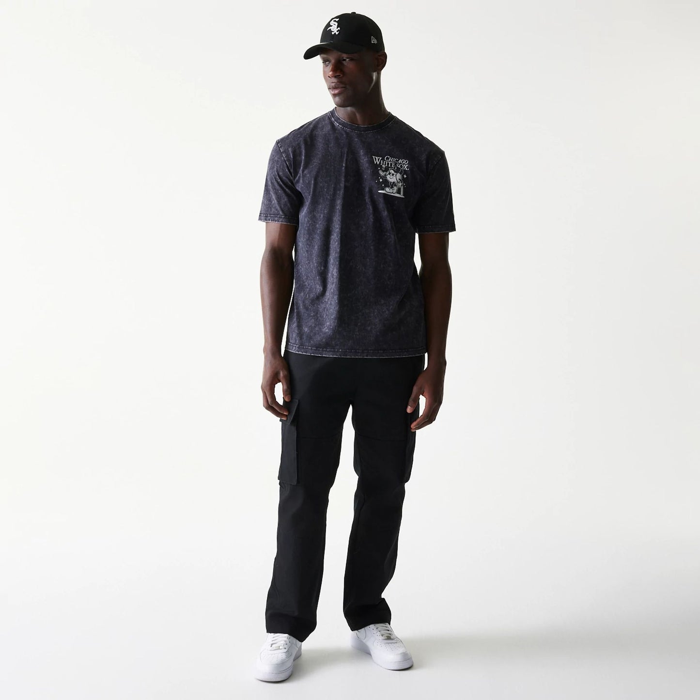 The Male model is wearing Chicago White Sox MLB Character Black T-Shirt 6