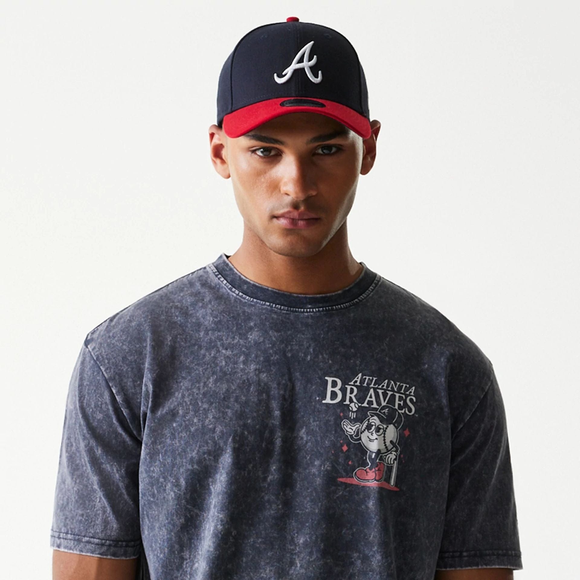 The Male model is wearing Atlanta Braves MLB Character Navy T-Shirt 5