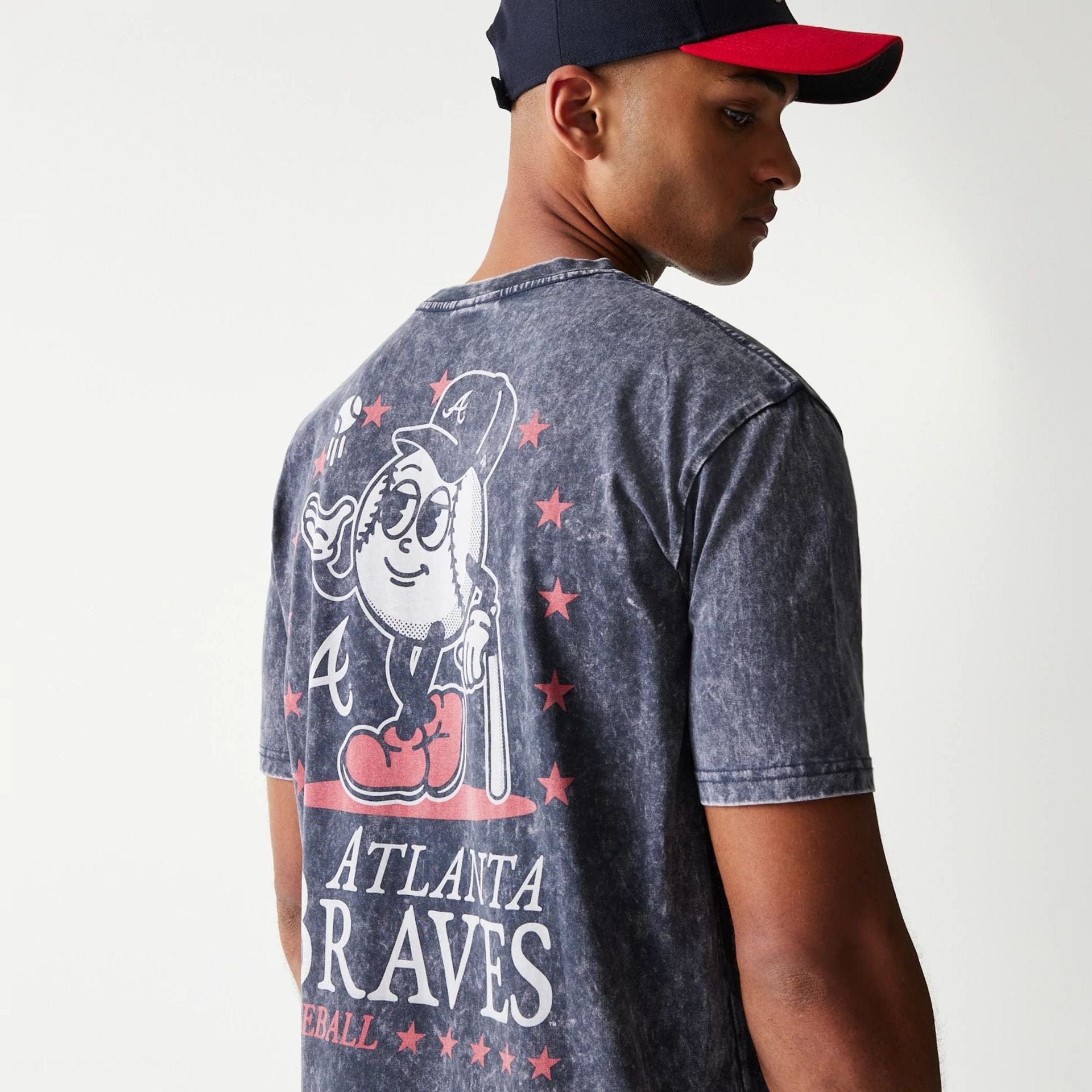 The Male model is wearing Atlanta Braves MLB Character Navy T-Shirt 4