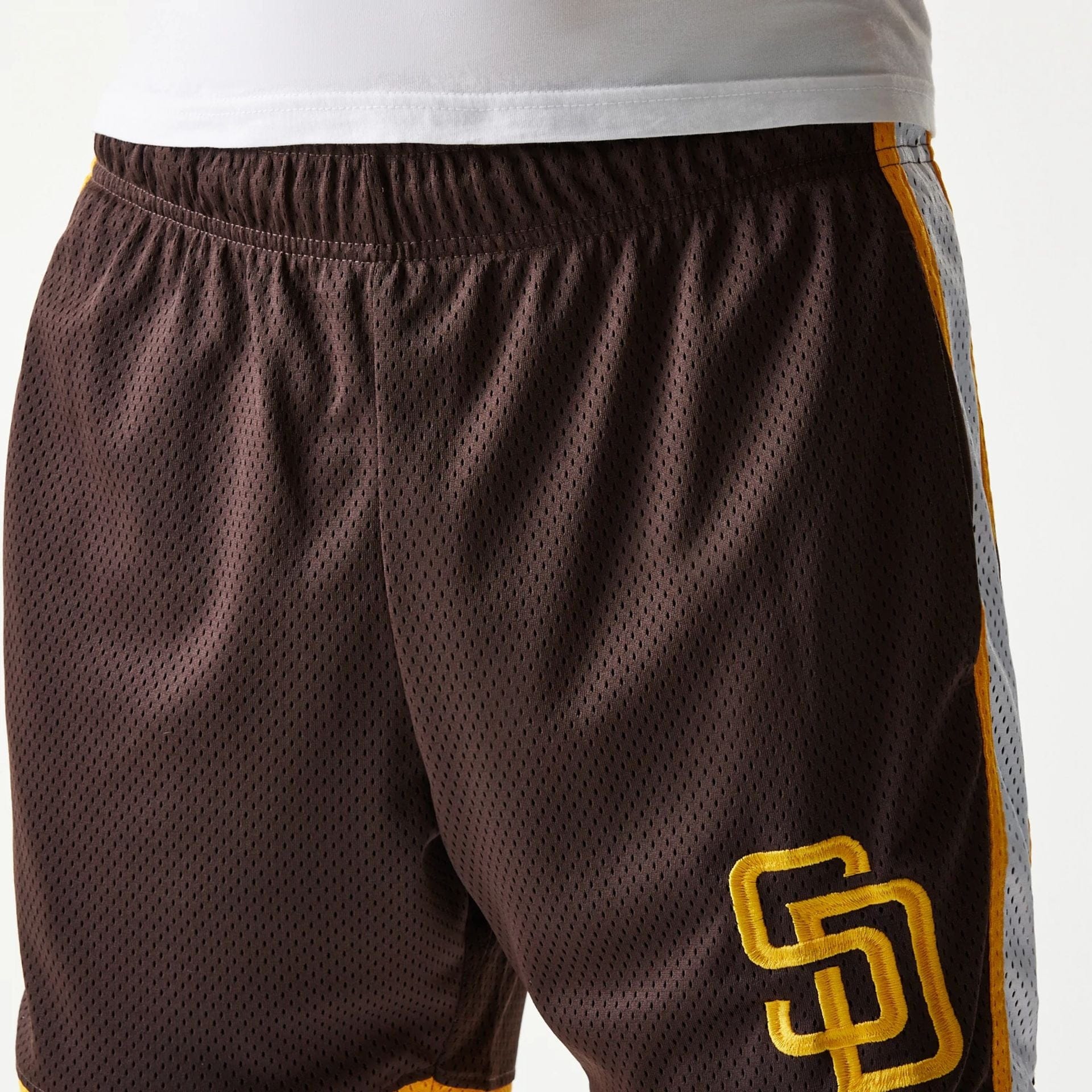 The Male model is wearing San Diego Padres Sport Classic Dark Brown Shorts 6
