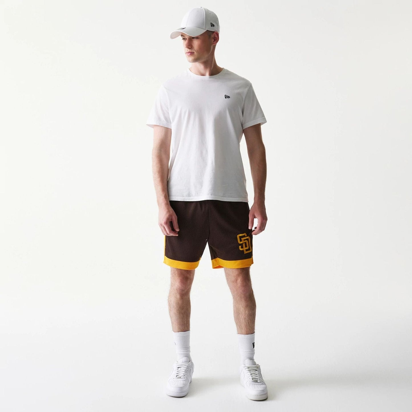 The Male model is wearing San Diego Padres Sport Classic Dark Brown Shorts 8