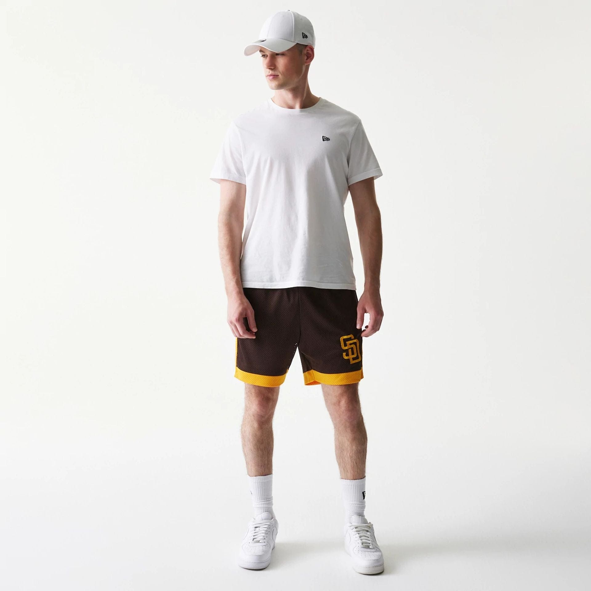 The Male model is wearing San Diego Padres Sport Classic Dark Brown Shorts 8