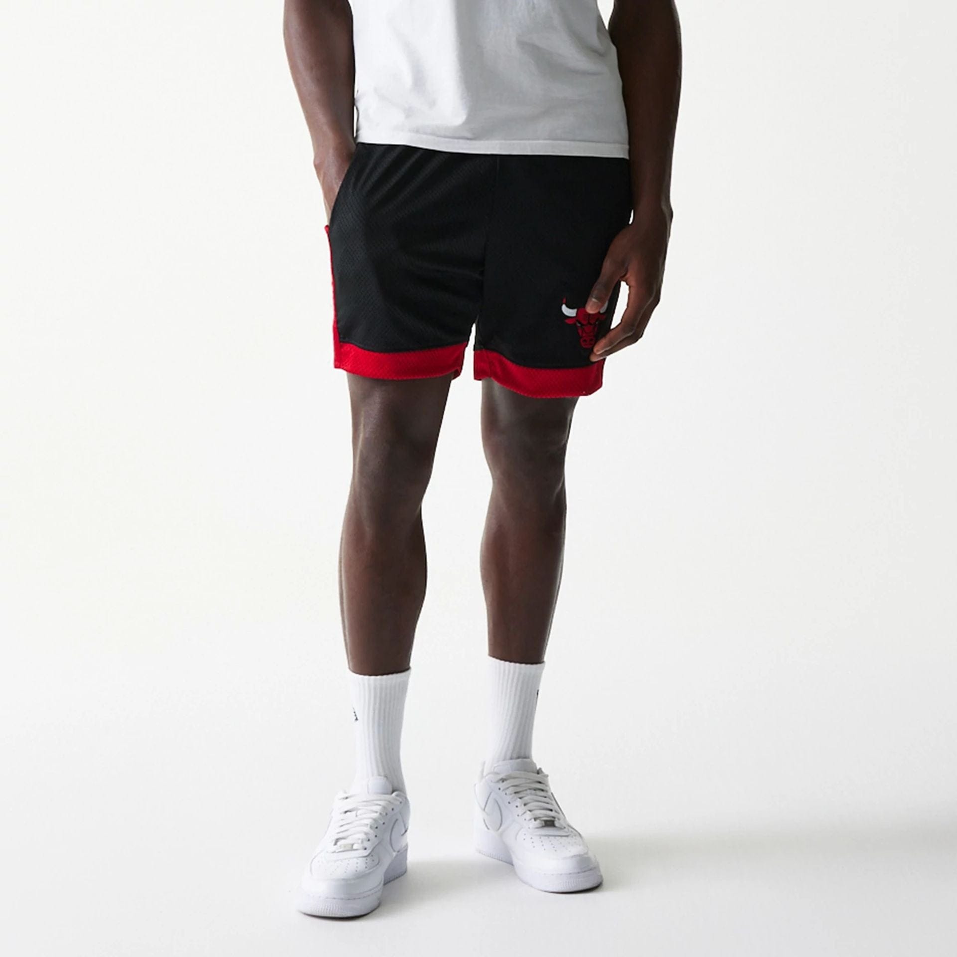 The Male model is wearing Chicago Bulls Sport Classic Black Shorts 7