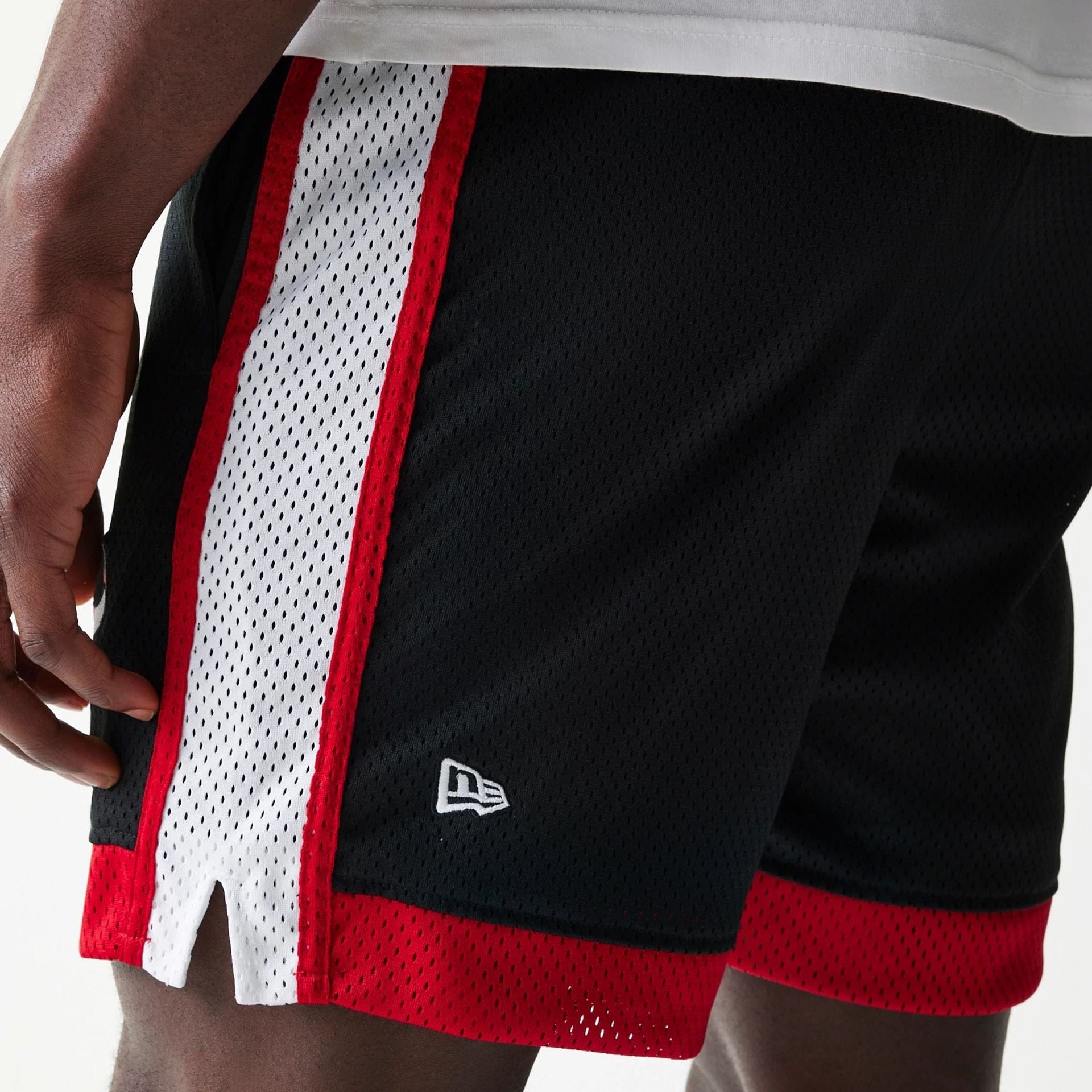 The Male model is wearing Chicago Bulls Sport Classic Black Shorts 4