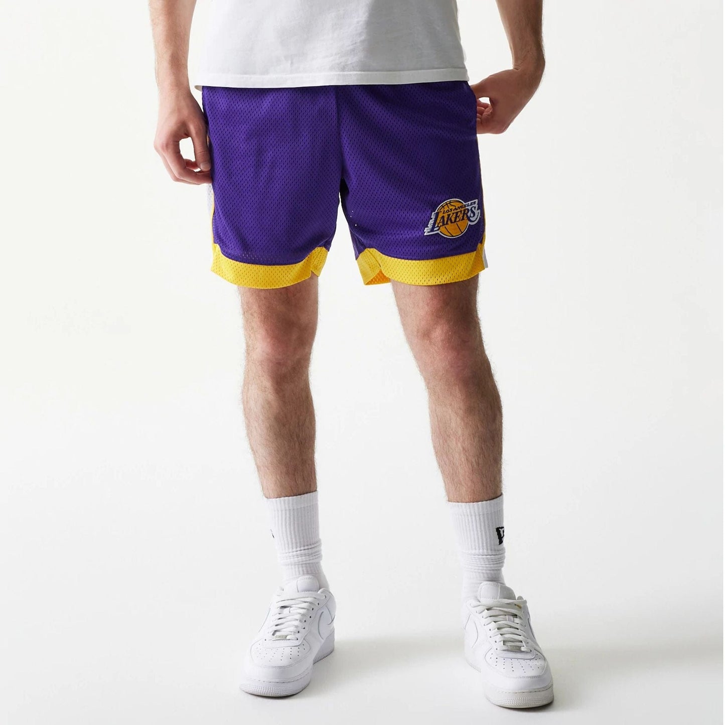 The Male model is wearing LA Lakers Sport Classic Purple Shorts 1