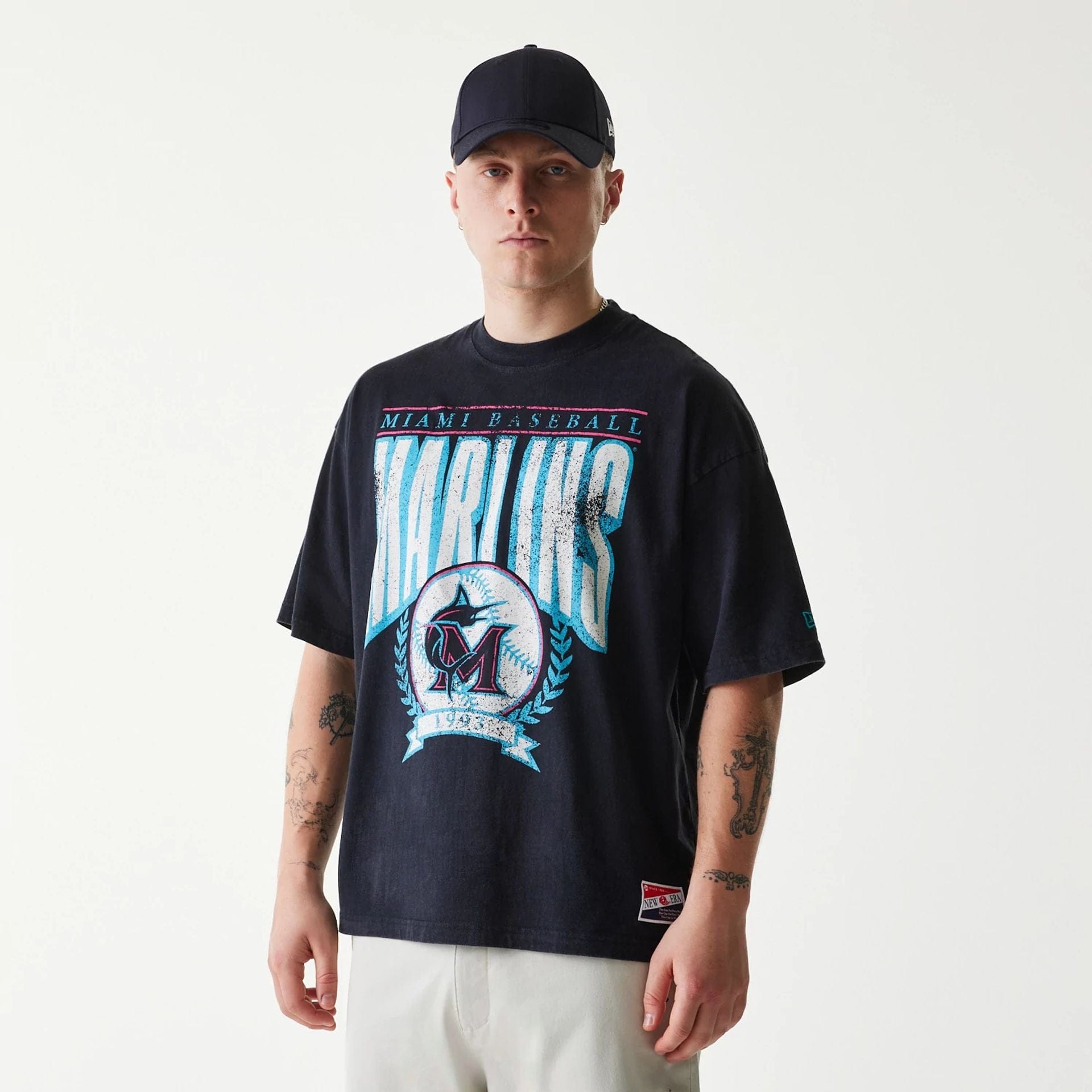 The Male model is wearing Miami Marlins MLB City Connect G1 Black T-Shirt 1