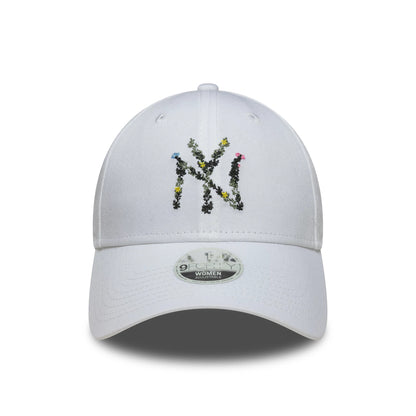 New York Yankees Womens MLB Floral Infill White New Era 9FORTY Adjustable Cap, front view showing the NY logo in floral embroidery on the structured white crown, with a 9FORTY size sticker on the curved visor.
