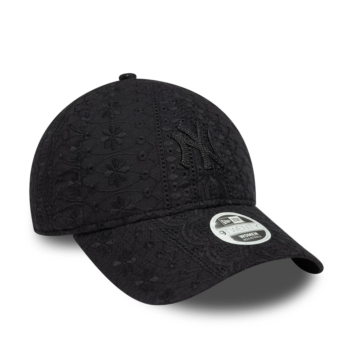 New York Yankees Womens MLB Broderie Black New Era 9TWENTY Adjustable Cap, three-quarter view showing the raised embroidered NY logo on the front panel with intricate floral broderie pattern, curved visor and 9TWENTY size sticker on the top.