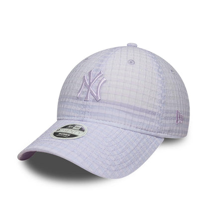 New York Yankees Womens MLB Seersucker Pastel Purple New Era 9TWENTY Adjustable Cap, three-quarter view showing the purple embroidered NY logo on the front panels, curved visor with 9TWENTY size sticker and New Era flag logo on the left side.