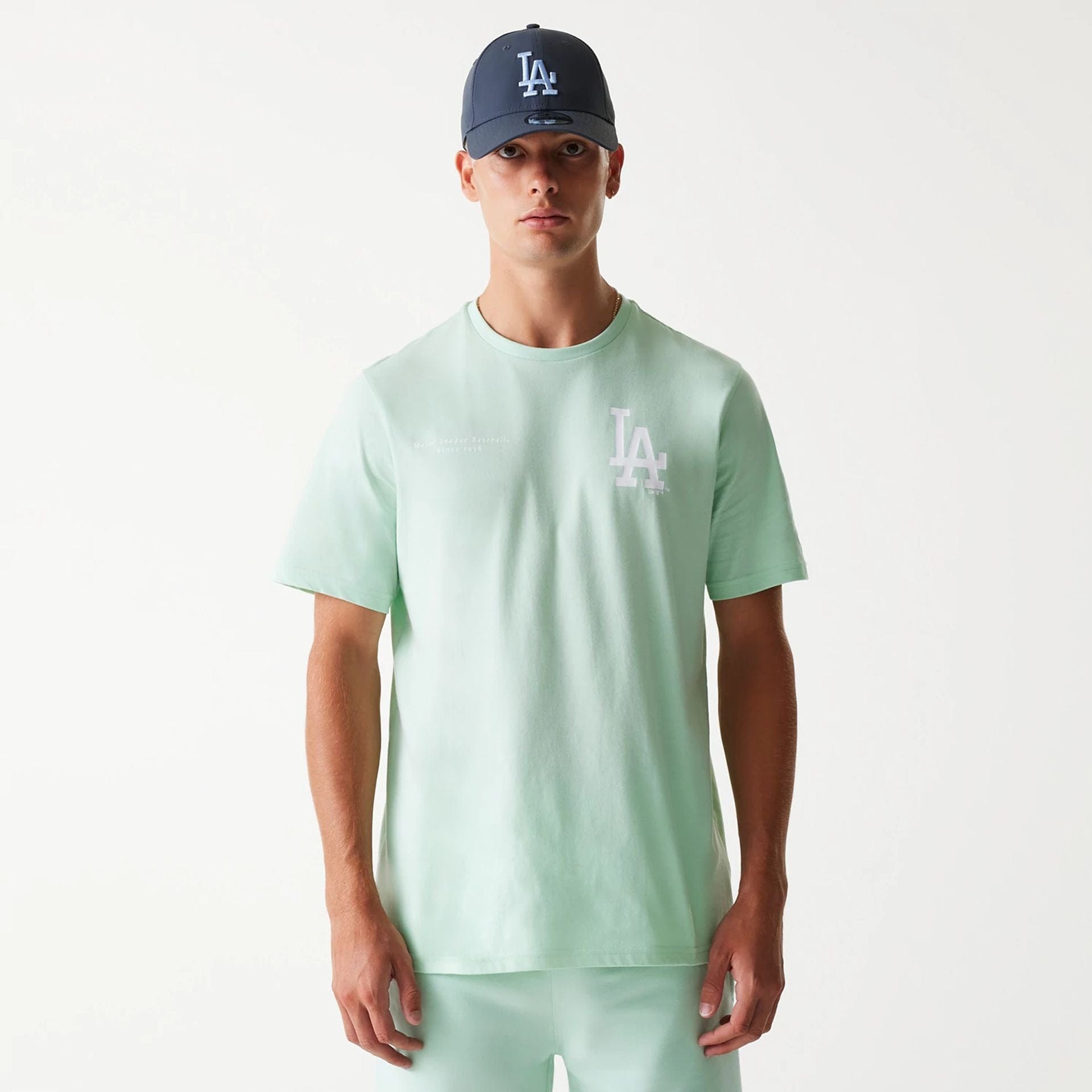 The Male model is wearing LA Dodgers MLB Arch Graphic Pastel Green T-Shirt 1