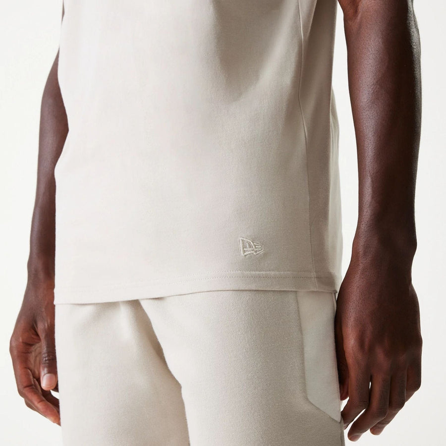 The Male model is wearing New York Yankees MLB Cream Sleeveless T-Shirt 5