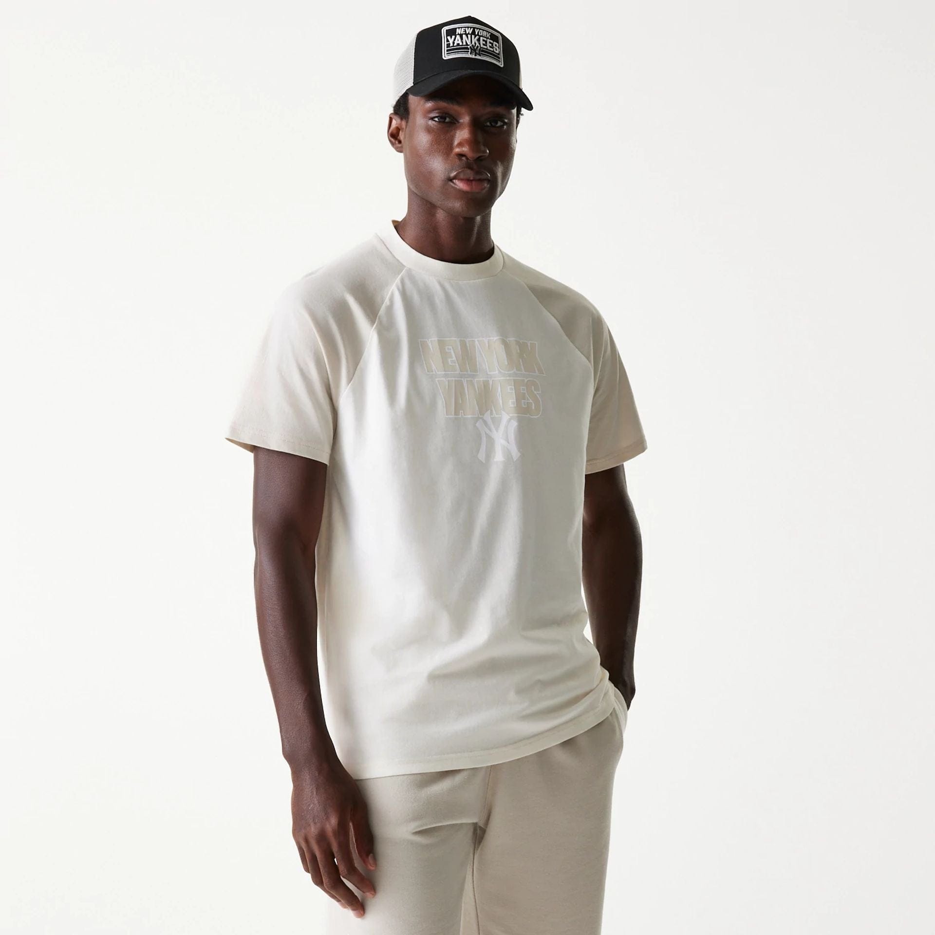 The Male model is wearing New York Yankees MLB Raglan Open White Oversized T-Shirt 1