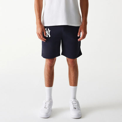 The Male model is wearing New York Yankees MLB League Essential Navy Shorts 8