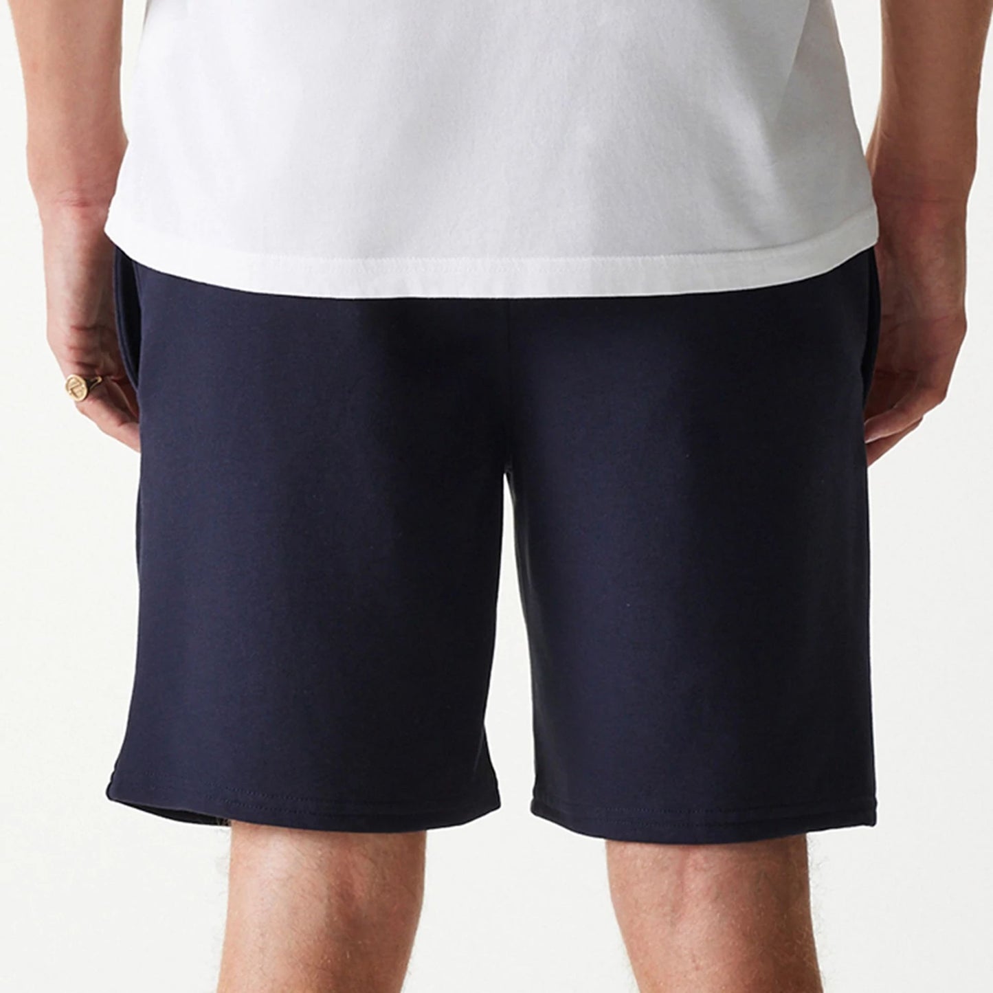 The Male model is wearing New York Yankees MLB League Essential Navy Shorts 4