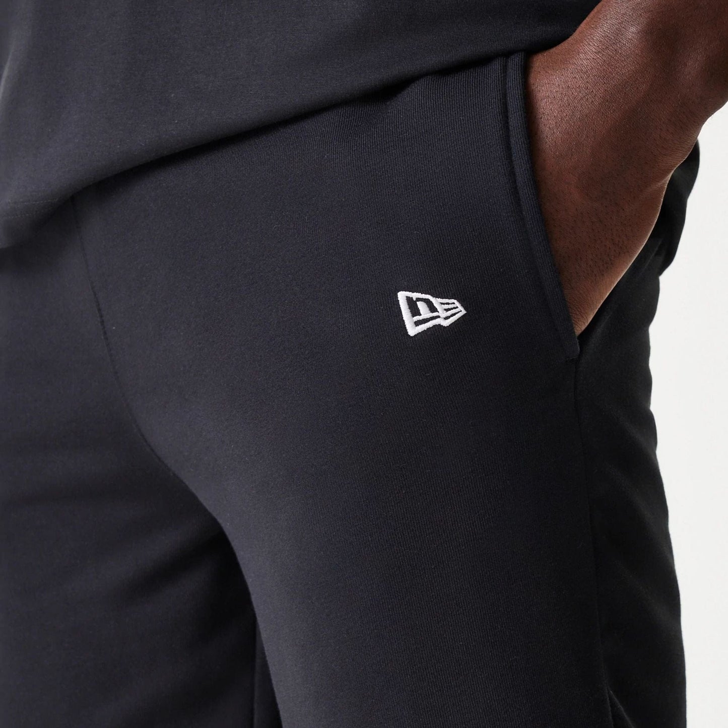 The Male model is wearing Chicago White Sox MLB League Essential Black Shorts 6