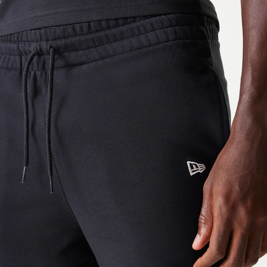 The Male model is wearing Chicago White Sox MLB League Essential Black Shorts 7