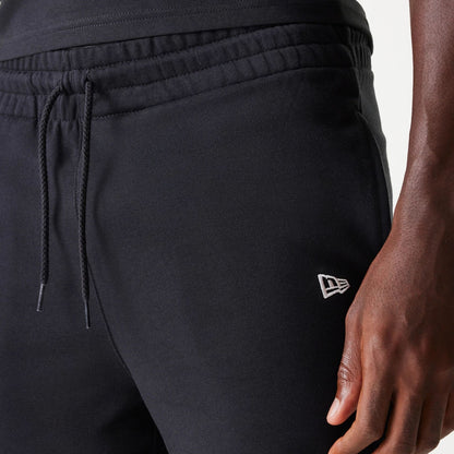 The Male model is wearing Chicago White Sox MLB League Essential Black Shorts 7