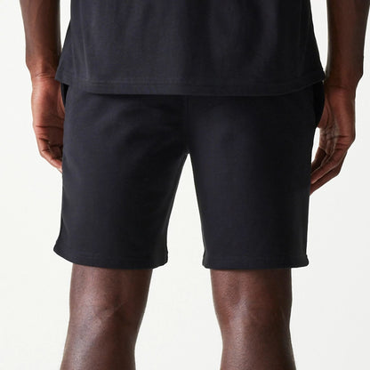 The Male model is wearing Chicago White Sox MLB League Essential Black Shorts 4