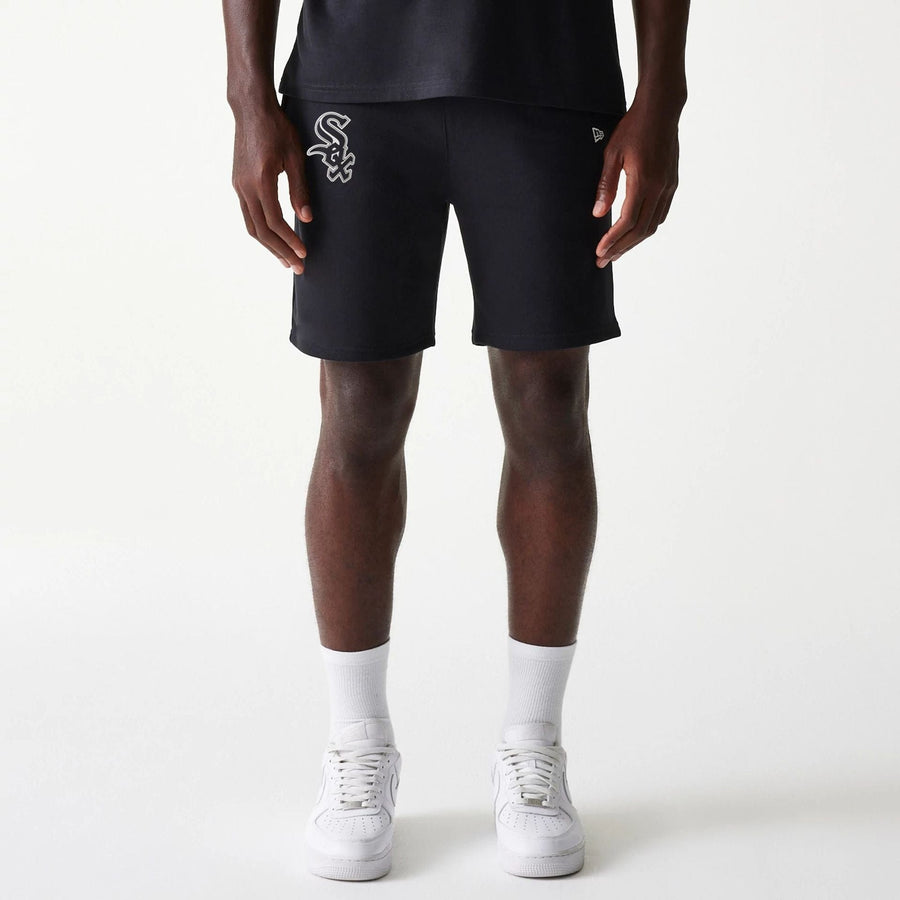 The Male model is wearing Chicago White Sox MLB League Essential Black Shorts 1