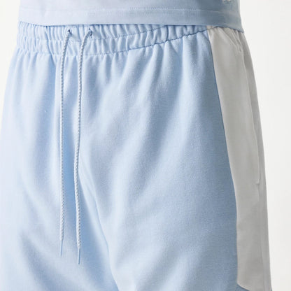 The Male model is wearing LA Dodgers MLB Raglan Pastel Blue Shorts 5