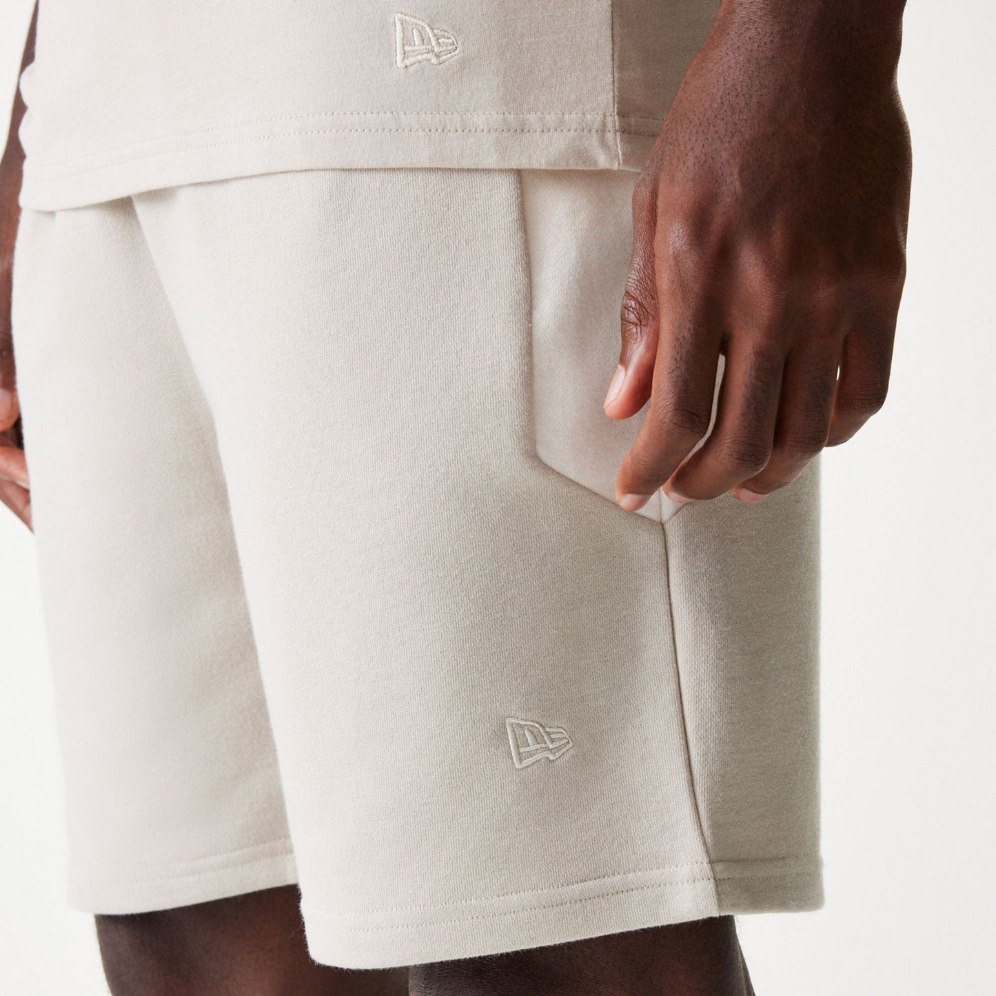 The Male model is wearing New York Yankees MLB Raglan Cream Shorts 5