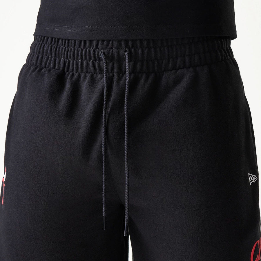 The Male model is wearing Chicago Bulls NBA Team Graphic Black Shorts 8