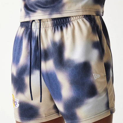 The Male model is wearing LA Lakers NBA All Over Print Cream Shorts 6