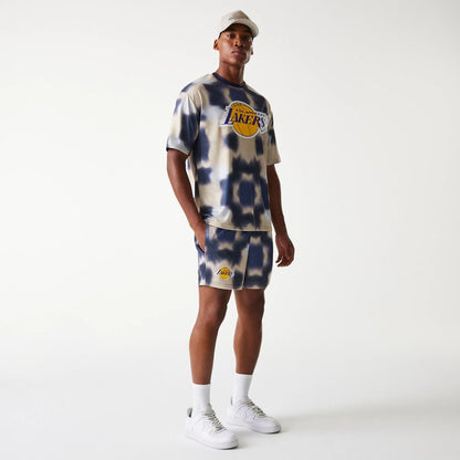 The Male model is wearing LA Lakers NBA All Over Print Cream Shorts 8
