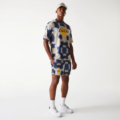 The Male model is wearing LA Lakers NBA All Over Print Cream Shorts 8