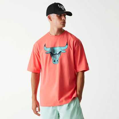The Male model is wearing Chicago Bulls NBA All Over Print Infill Pink Oversized T-Shirt 1