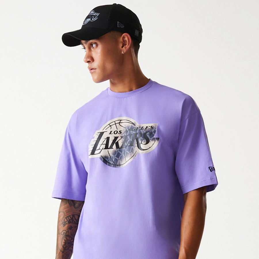 The Male model is wearing LA Lakers NBA All Over Print Infill Purple Oversized T-Shirt 3
