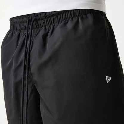The Male model is wearing New Era Black Swim Shorts 7