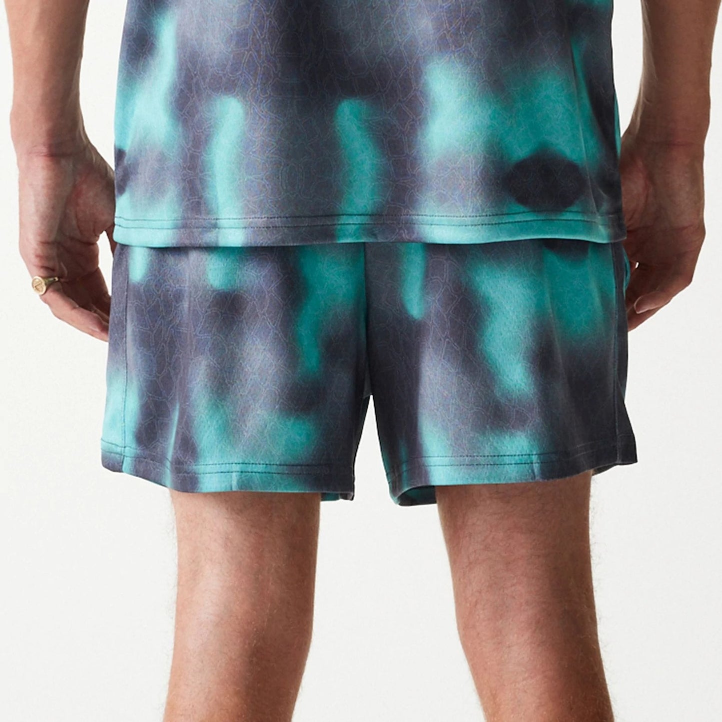 The Male model is wearing Chicago Bulls NBA All Over Print Green Shorts 7