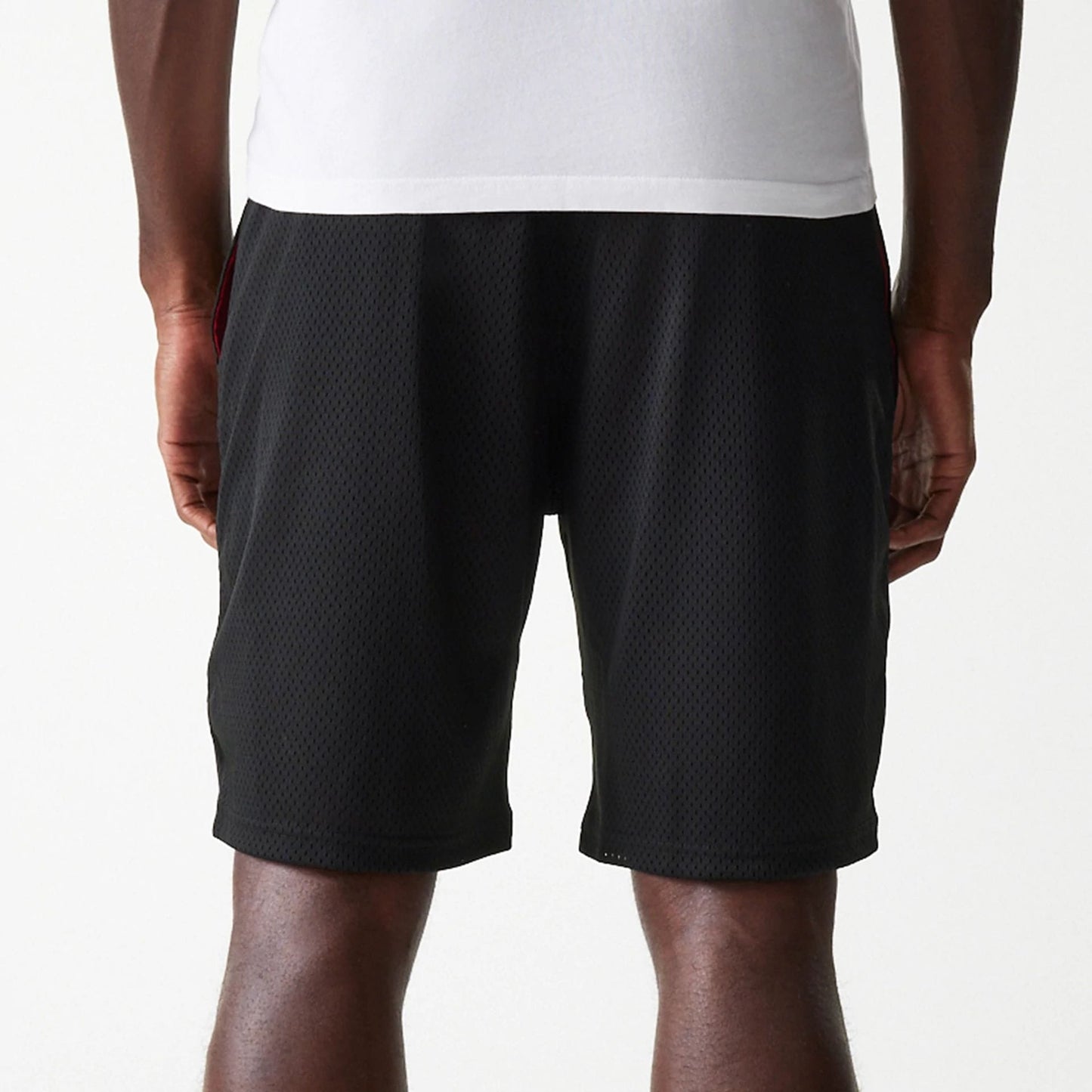 The Male model is wearing New Era Black Mesh Shorts 7