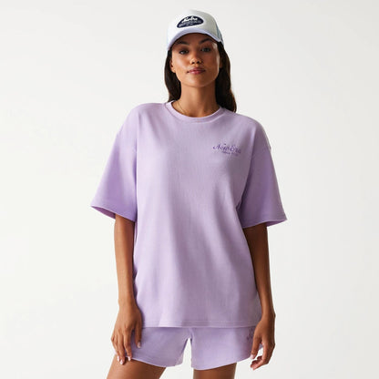 The Male model is wearing New Era Waffle Pastel Purple Oversized T-Shirt 4