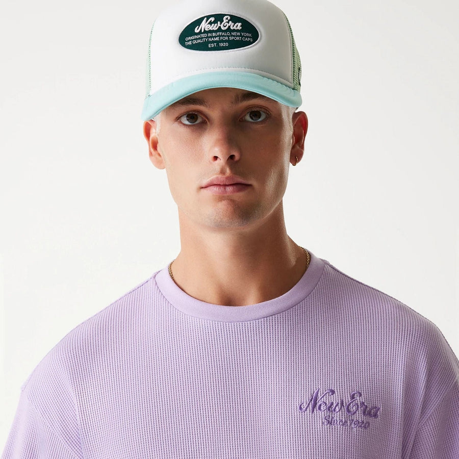 The Male model is wearing New Era Waffle Pastel Purple Oversized T-Shirt 5