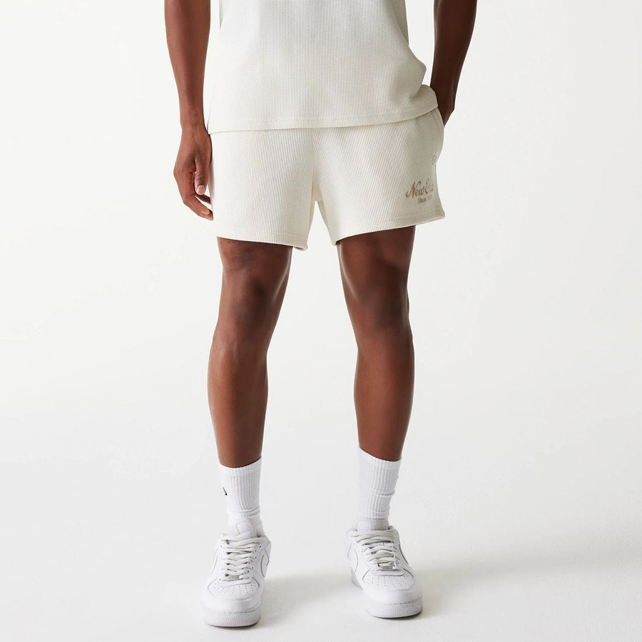 The Male model is wearing New Era Waffle Open White Shorts 1