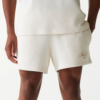 The Male model is wearing New Era Waffle Open White Shorts 3