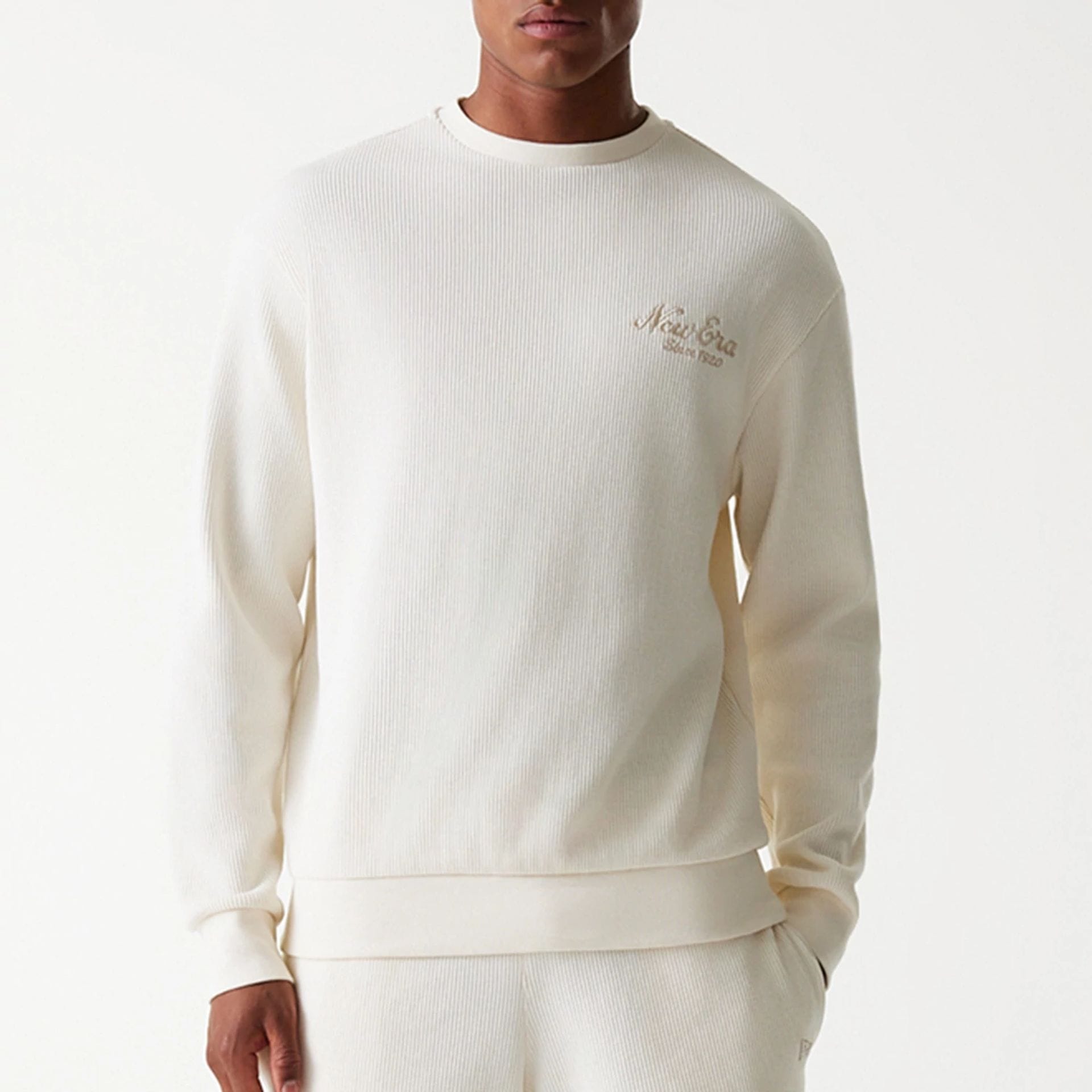 The Male model is wearing New Era Waffle Open White Oversized Crew Neck Sweater 5