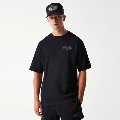 The Male model is wearing New Era Waffle Black Oversized T-Shirt 3