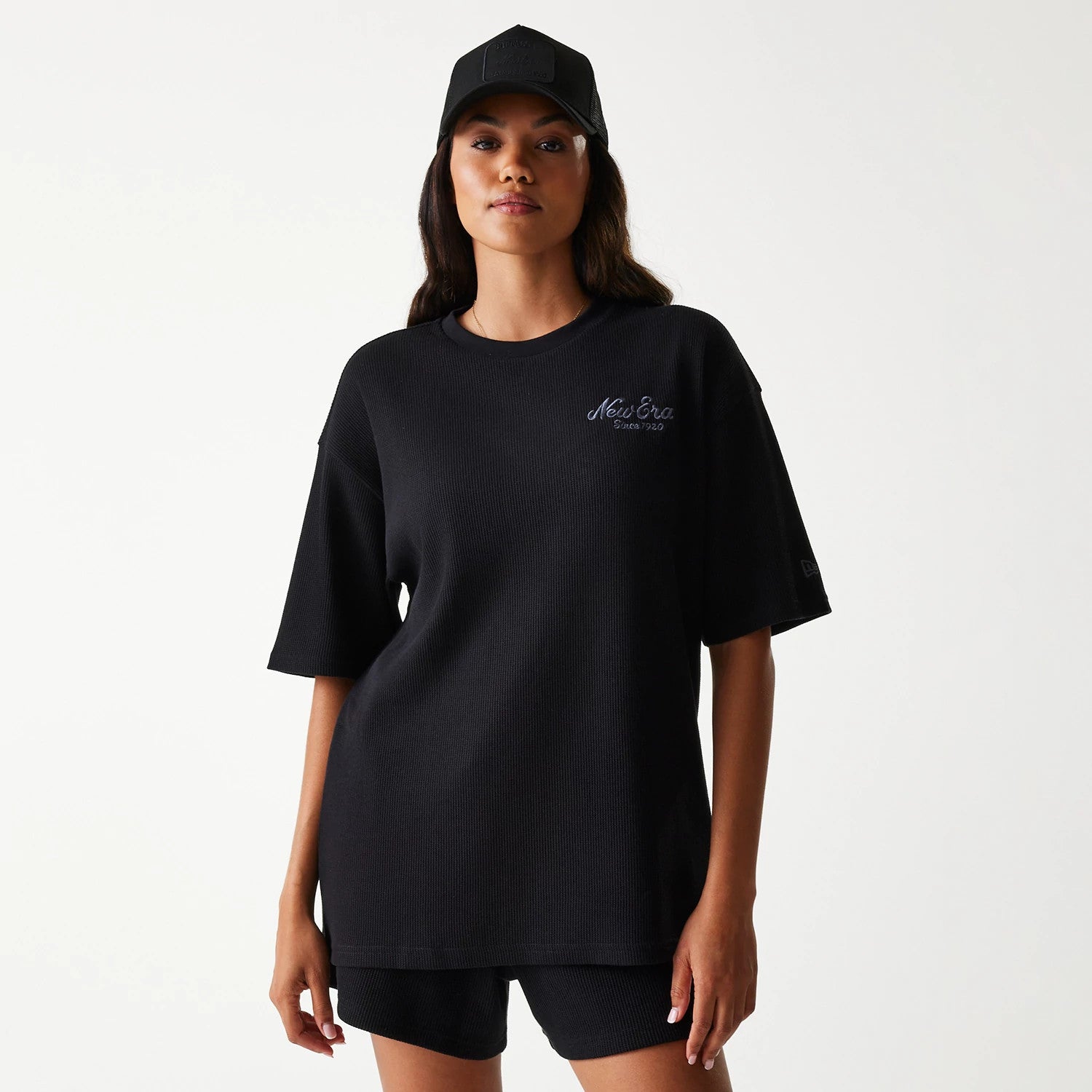 The Male model is wearing New Era Waffle Black Oversized T-Shirt 4