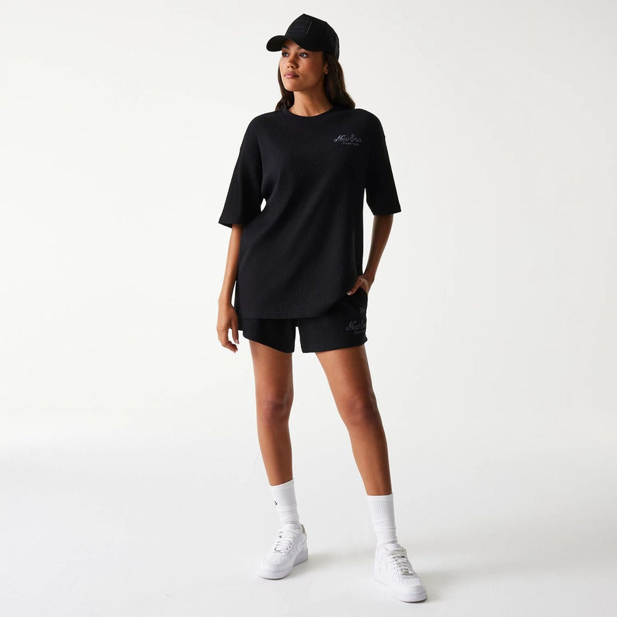 The Male model is wearing New Era Waffle Black Oversized T-Shirt 6